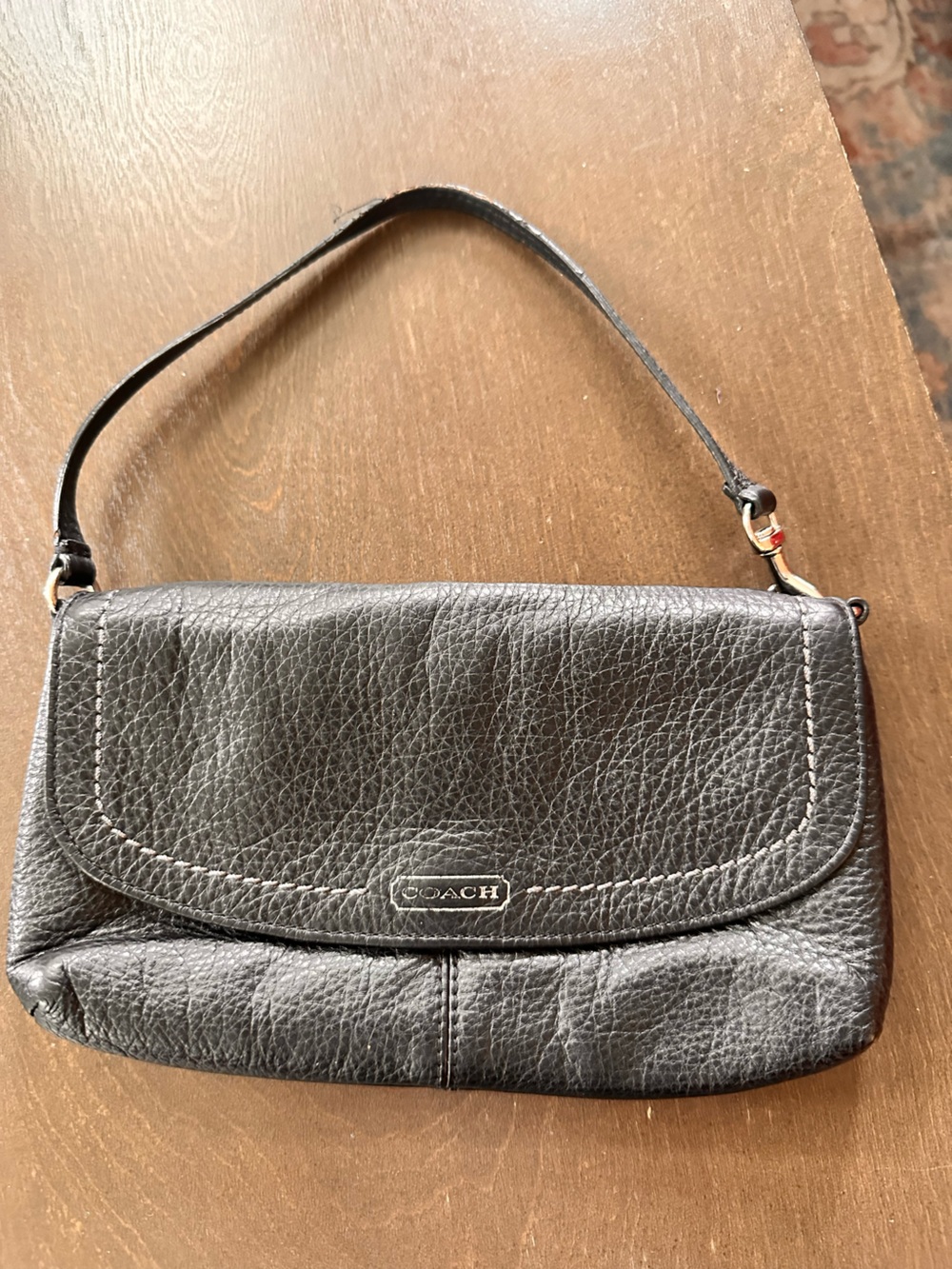 COACH Pebbled Leather Wristlet in black